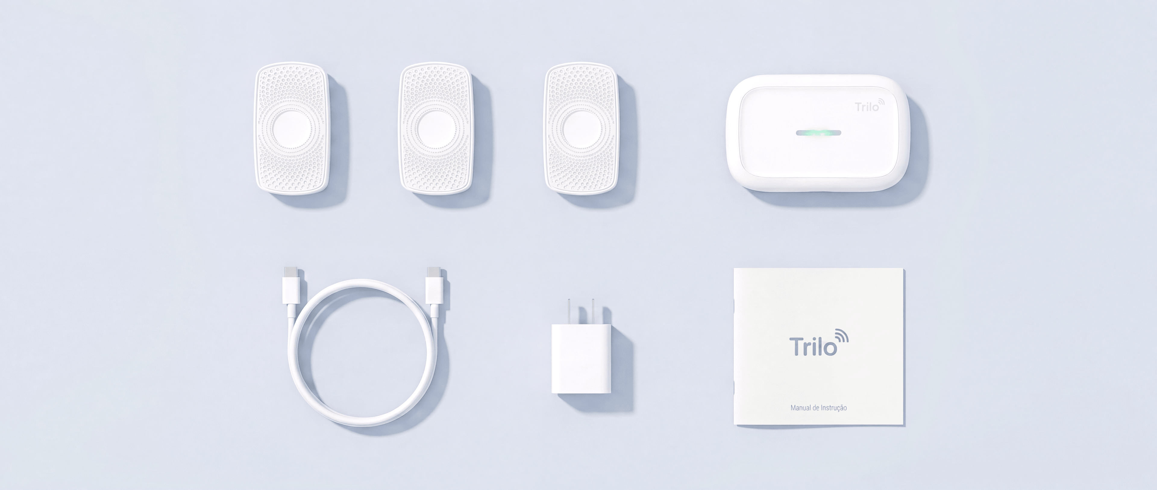 Kit Trilo visto de cima: sensores, Base, cabo, fonte e manual